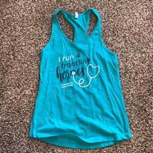 Frontline heroes running tank. Never worn.